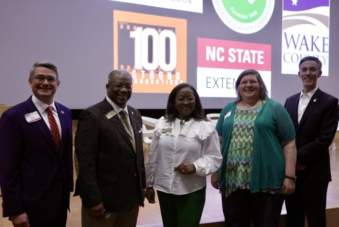 NCACC Executive Director Kevin Leonard (left) pictured with Wake County Commissioners Donald Mial (center, left), Chair Shinica Thomas (center), Vickie Adamson (center, right) and Matt Calabria (right) during the documentary screening at NC State University.